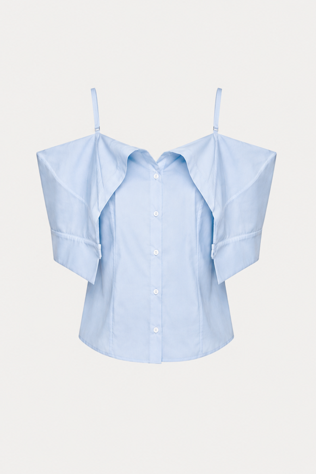 A light blue button-up blouse with unique draped shoulder panels and thin shoulder straps