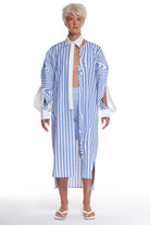 PRINTED LONG COTTON SHIRT WITH LONG SLEEVES WITH CUTTINGS AND BUTTONING, INTERESTING CUT ON THE COLLAR AND LONGER BACK