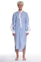 PRINTED LONG COTTON SHIRT WITH LONG SLEEVES WITH CUTTINGS AND BUTTONING, INTERESTING CUT ON THE COLLAR AND LONGER BACK