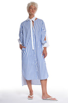 PRINTED LONG COTTON SHIRT WITH LONG SLEEVES WITH CUTTINGS AND BUTTONING, INTERESTING CUT ON THE COLLAR AND LONGER BACK