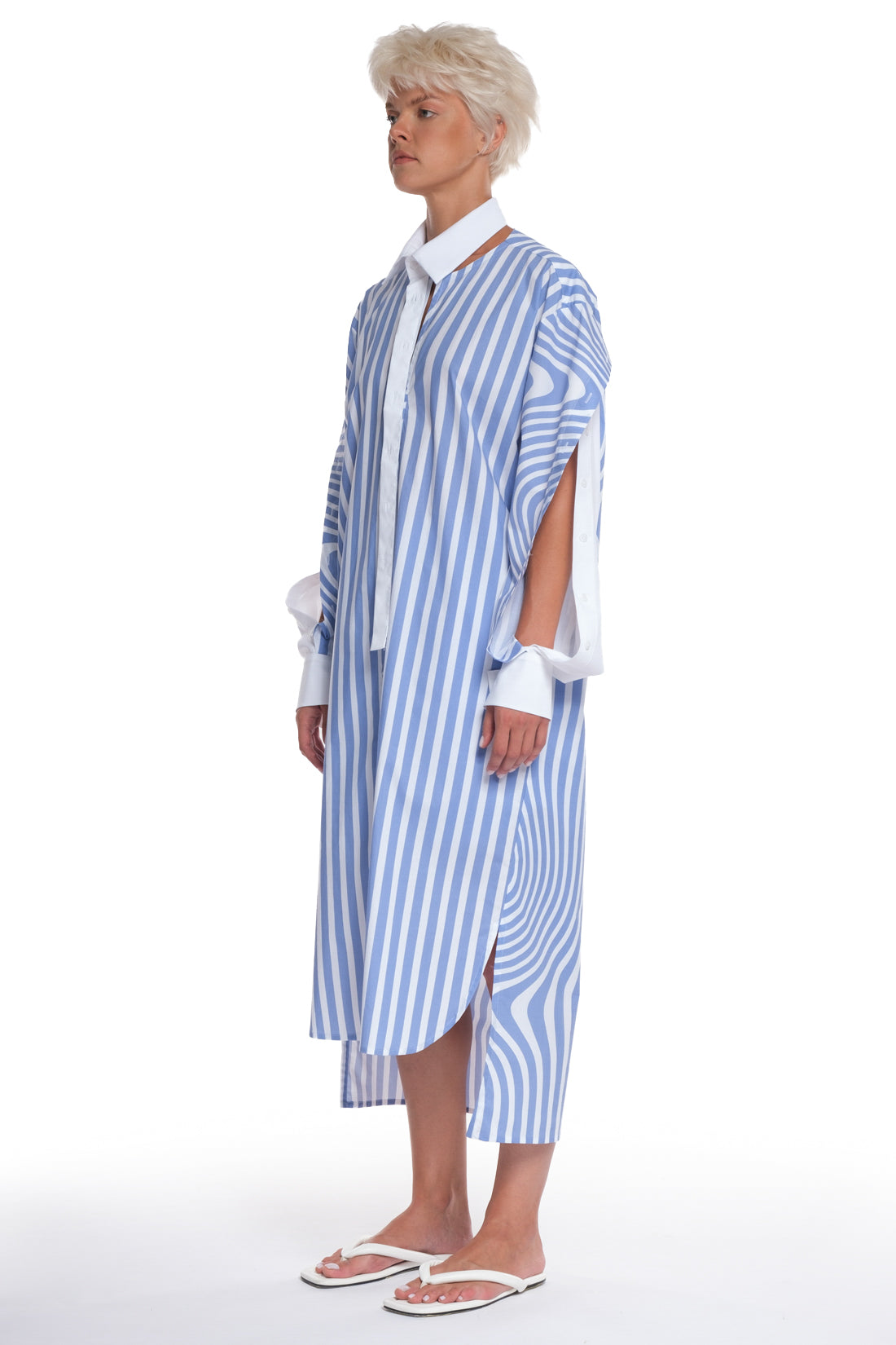 PRINTED LONG COTTON SHIRT WITH LONG SLEEVES WITH CUTTINGS AND BUTTONING, INTERESTING CUT ON THE COLLAR AND LONGER BACK