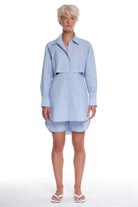 LONG COTTON SHIRT WITH HORIZONTAL BACK CUTTING AND BUTTONING, LONG SLEEVES AND OPEN BACK