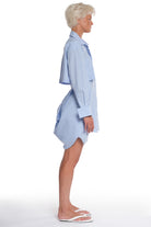 LONG COTTON SHIRT WITH HORIZONTAL BACK CUTTING AND BUTTONING, LONG SLEEVES AND OPEN BACK