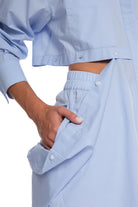 LONG COTTON SHIRT WITH HORIZONTAL BACK CUTTING AND BUTTONING, LONG SLEEVES AND OPEN BACK