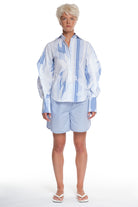 PRINTED LONG SLEEVE SHIRT WITH BUTTONING AND CUTTINGS ON THE SLEEVES, OPEN COLLAR