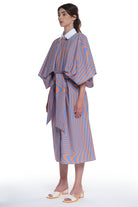 PRINTED LONG SHIRT-DRESS, BUTTONING IN FRONT, HIGH COLLAR, TIED WITH A BELT IN FRONT