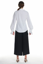 LONG SLEEVE SHIRT WITH BUTTONING ON THE FRONT, HIGH COLLAR, RUFFLED LAYERS ON THE SLEEVES