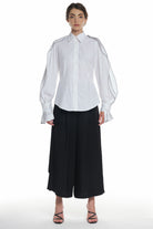 LONG SLEEVE SHIRT WITH BUTTONING ON THE FRONT, HIGH COLLAR, RUFFLED LAYERS ON THE SLEEVES