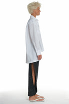 LONG SLEEVE COTTON SHIRT WITH TWO DIFFERENT TYPES OF COLLAR, CUTTINGS IN FRONT AND ON THE SHOULDERS, LONGER ON THE BACK
