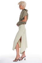 ASYMMETRICAL LONG SKIRT WITH CUTTING AND BUTTONING ON THE SIDE