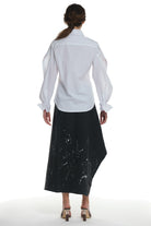 LONG SLEEVE SHIRT WITH CUTTINGS ON THE SLEEVES AND BUTTONING