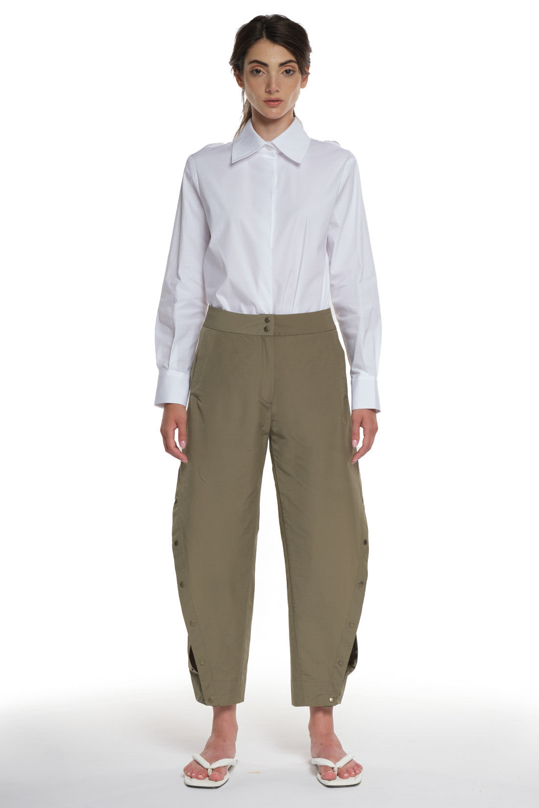 RAIN PROOF LONG PANTS WITH CUTTINGS AND BUTTONING ON THE SIDES