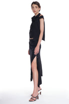 ASYMMETRICAL LONG SKIRT WITH CUTTING AND BUTTONING ON THE SIDE