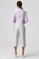 light purple shirt and gray pants