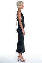 LONG ELEGANT DRESS WITH V NECK AND OPEN BACK.