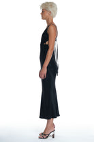 LONG ELEGANT DRESS WITH V NECK AND OPEN BACK.