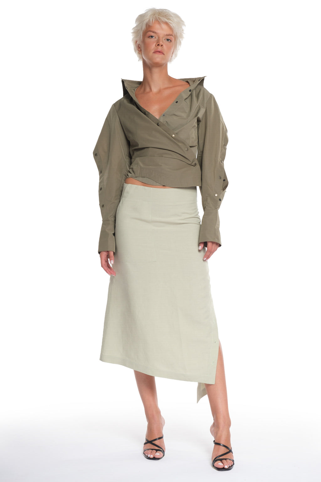 ASYMMETRICAL LONG SKIRT WITH CUTTING AND BUTTONING ON THE SIDE