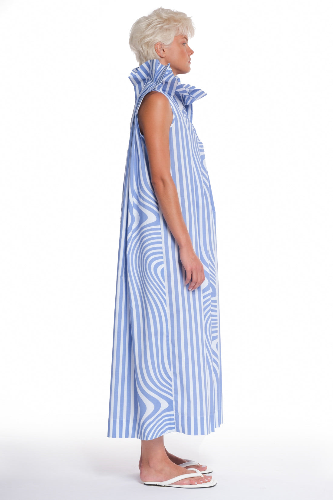 LONG SHIRT-DRESS WITH MANY FOLDINGS, BUTTONING IN FRONT