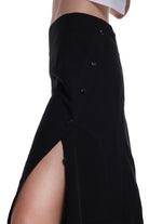 ASYMMETRICAL LONG SKIRT WITH CUTTING AND BUTTONING ON THE SIDE